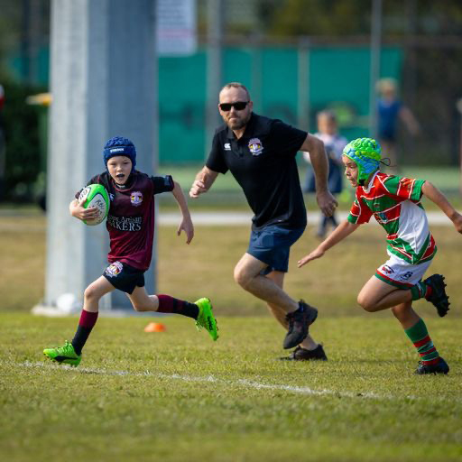 Brisbane junior rugby player scoring try