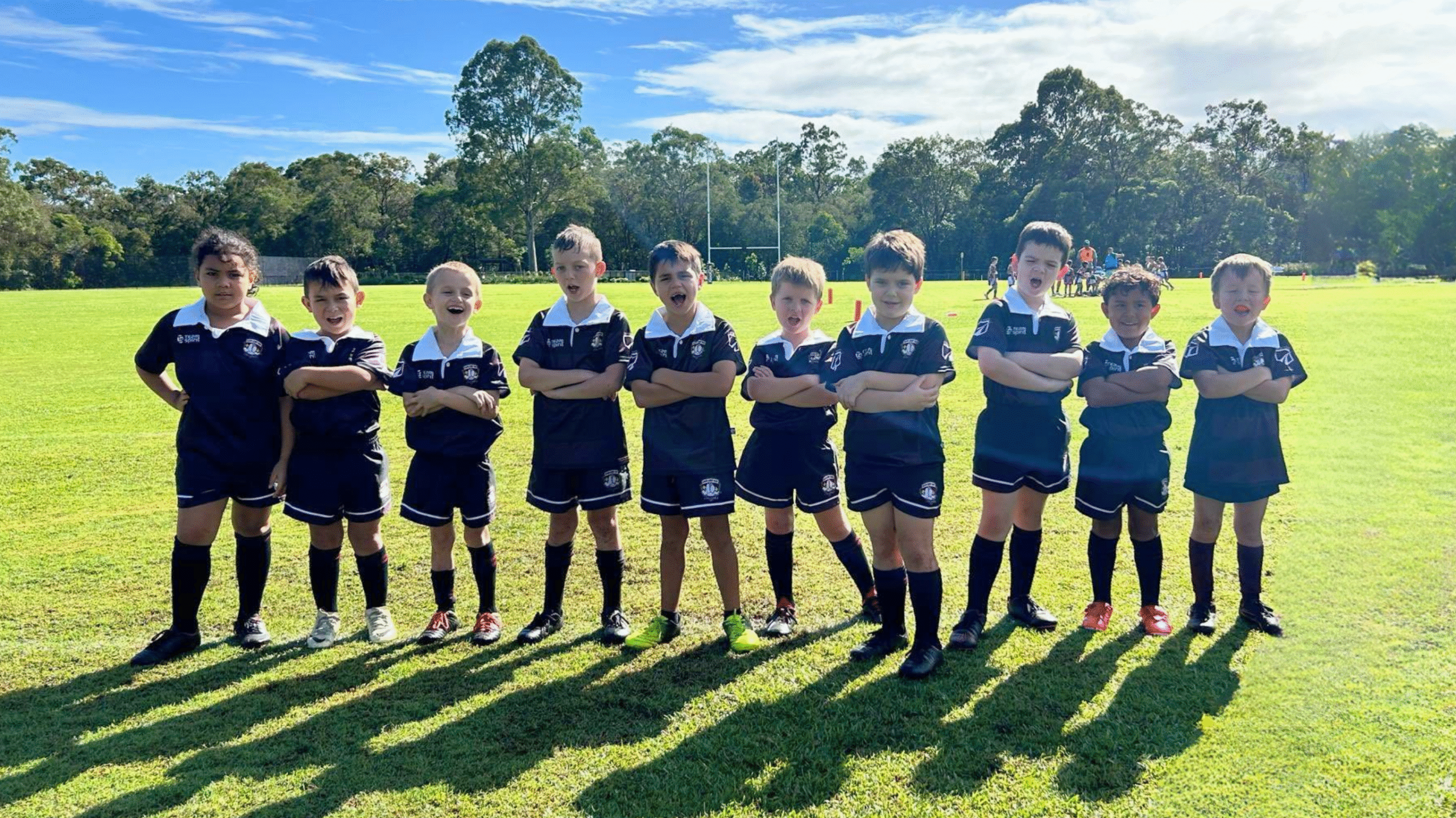 RBC Jnr Players lined up Junior Rugby Brisbane - Kids running for try